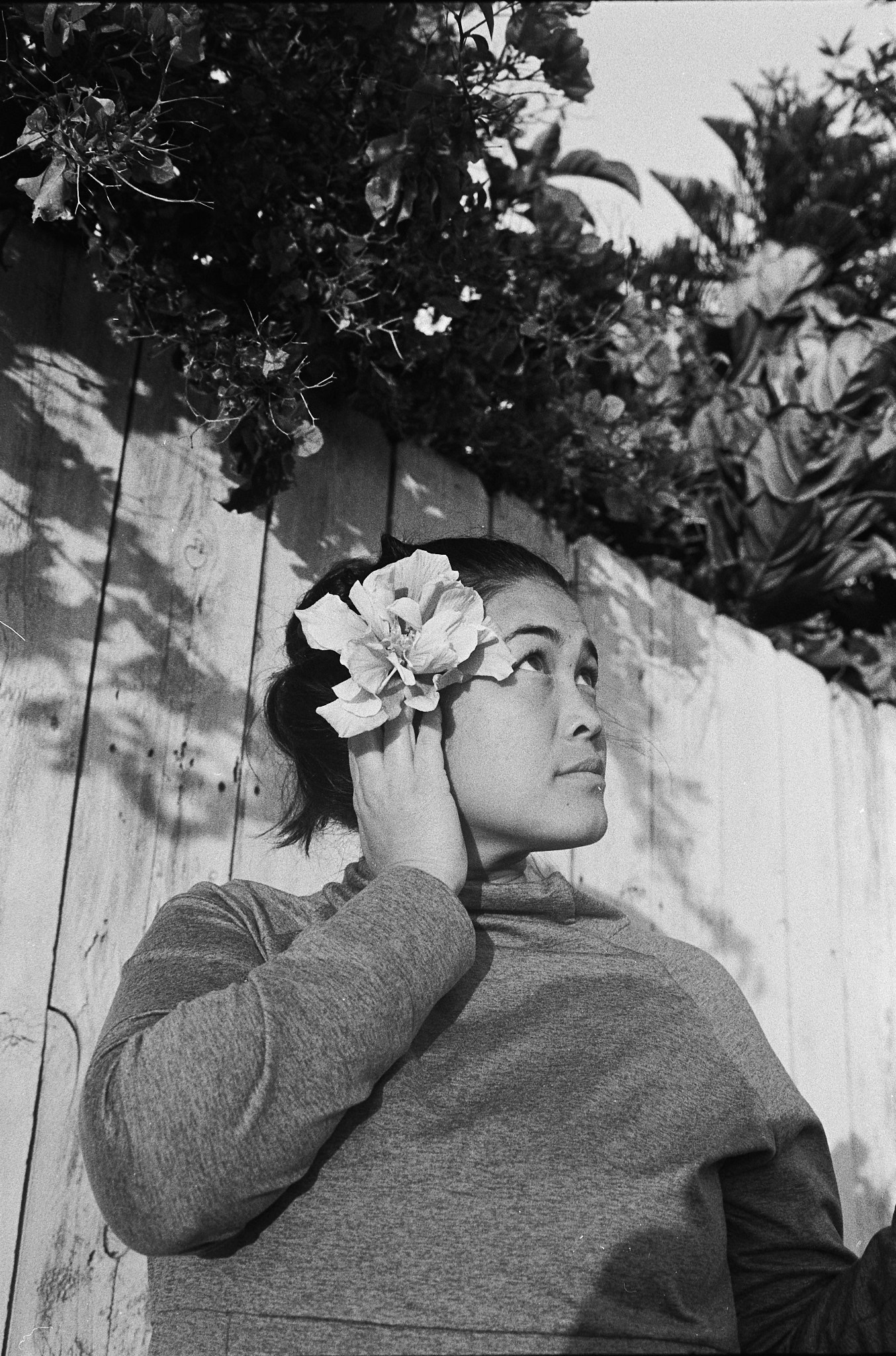 Woman with a flower in her ear